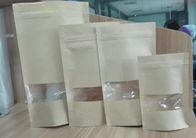 Brown a chiusura lampo sta sulle borse su misura sacchetto di imballaggio per alimenti dei sacchi di carta con la chiara finestra