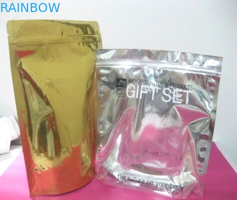 La superficie della metallina sta sulle borse cosmetiche/i sacchetti d'imballaggio polvere della perla a chiusura lampo