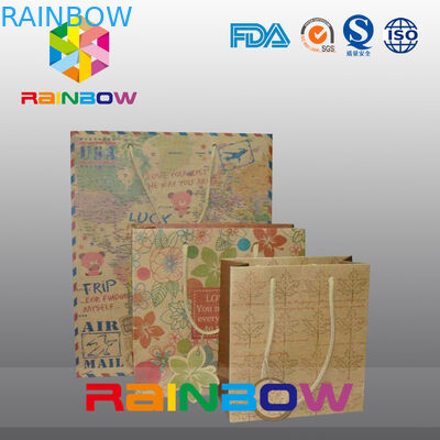 Il sacco di carta stampato promozionale del regalo/Natale su ordinazione incarta i sacchetti della spesa per i panni