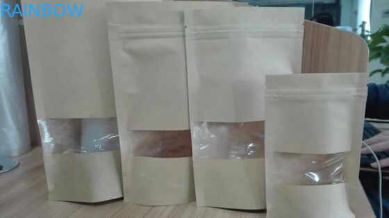 Brown a chiusura lampo sta sulle borse su misura sacchetto di imballaggio per alimenti dei sacchi di carta con la chiara finestra