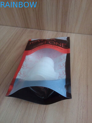 Stia sul recipiente di plastica riempito di semi della cannabis/borse di Noni con la chiusura lampo