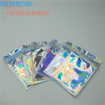 Il sacchetto laterale della stagnola della guarnizione tre che imballa, piccolo cosmetico sta sulle borse con la chiusura lampo