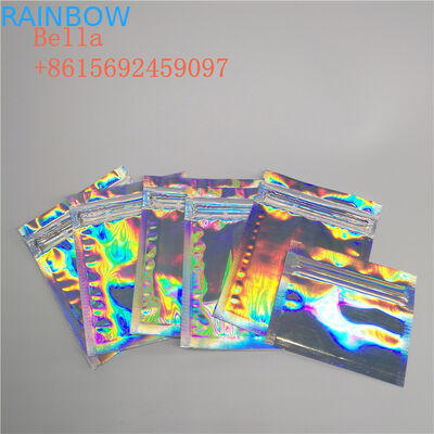 Il sacchetto laterale della stagnola della guarnizione tre che imballa, piccolo cosmetico sta sulle borse con la chiusura lampo