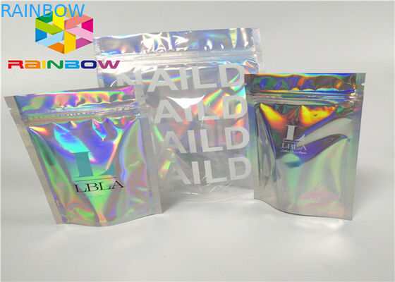 il laser d'imballaggio a chiusura lampo dell'ologramma della stagnola di plastica di mylar della chiusura lampo di stampa olografico sta sulla borsa del sacchetto dello zip per il regalo/bottiglie