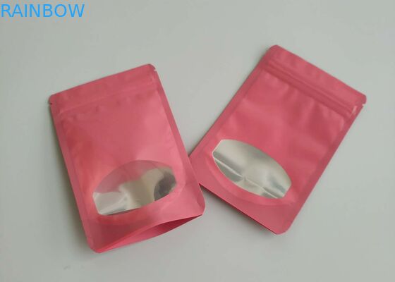 Sacchetti di plastica di colori differenti che imballano chiaramente le borse di Candy della frutta del cioccolato con la finestra