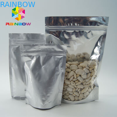 Il di alluminio all'ingrosso del commestibile sta sulla borsa a chiusura lampo con la chiara finestra anteriore per i semi/imballaggio della frutta secca