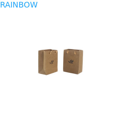 Doypack sta sulla piccola borsa fatta a mano della carta kraft del sacchetto riciclata con la maniglia