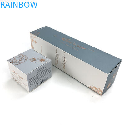 La scatola di carta che imballa per l'olio essenziale imbottiglia il cartone bianco della stagnola calda delle piccole scatole