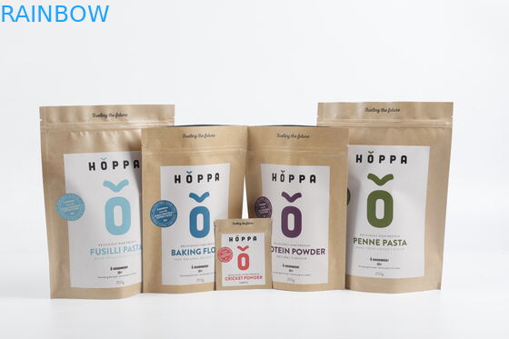 Il sacchetto biodegradabile su ordinazione della chiusura lampo di carta kraft di PLA sta sull'imballaggio per alimenti del tè