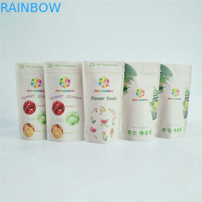 Il sacchetto biodegradabile su ordinazione della chiusura lampo di carta kraft di PLA sta sull'imballaggio per alimenti del tè