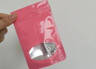 Sacchetti di plastica di colori differenti che imballano chiaramente le borse di Candy della frutta del cioccolato con la finestra