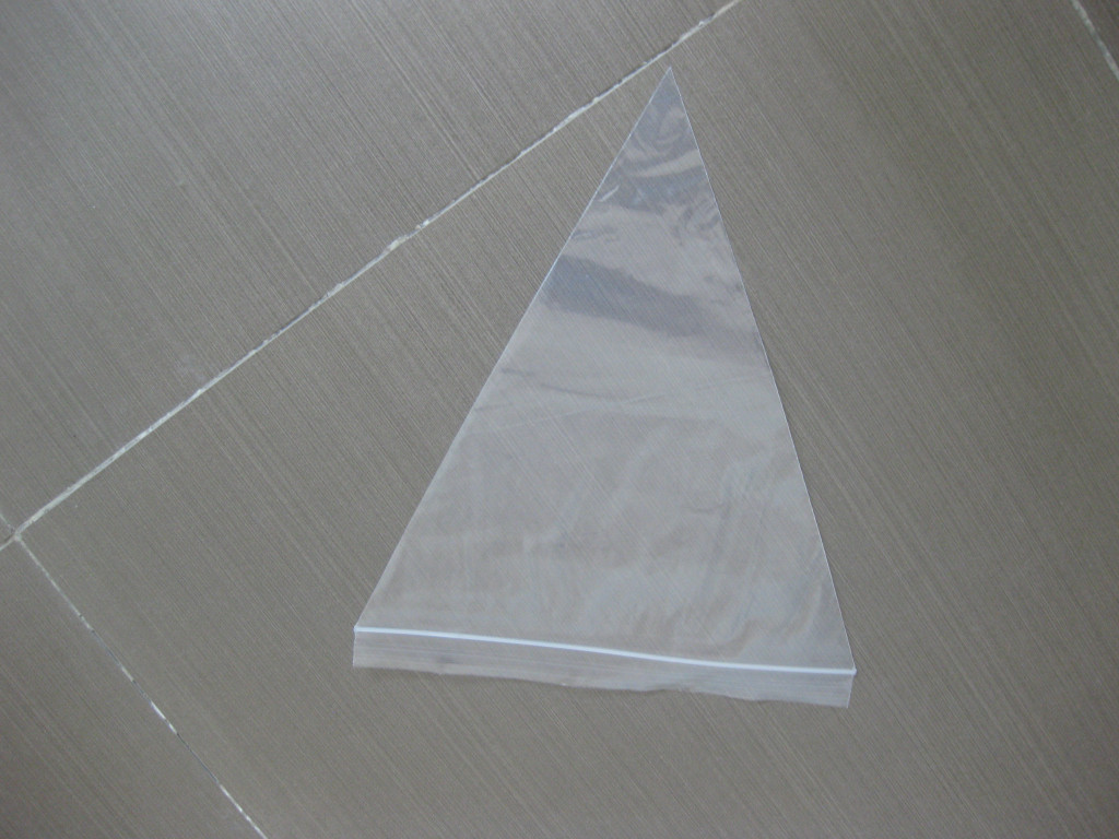 Borsa della guarnizione della presa del LDPE del triangolo con gli autoadesivi per il risparmiatore della pizza, fine della chiusura lampo
