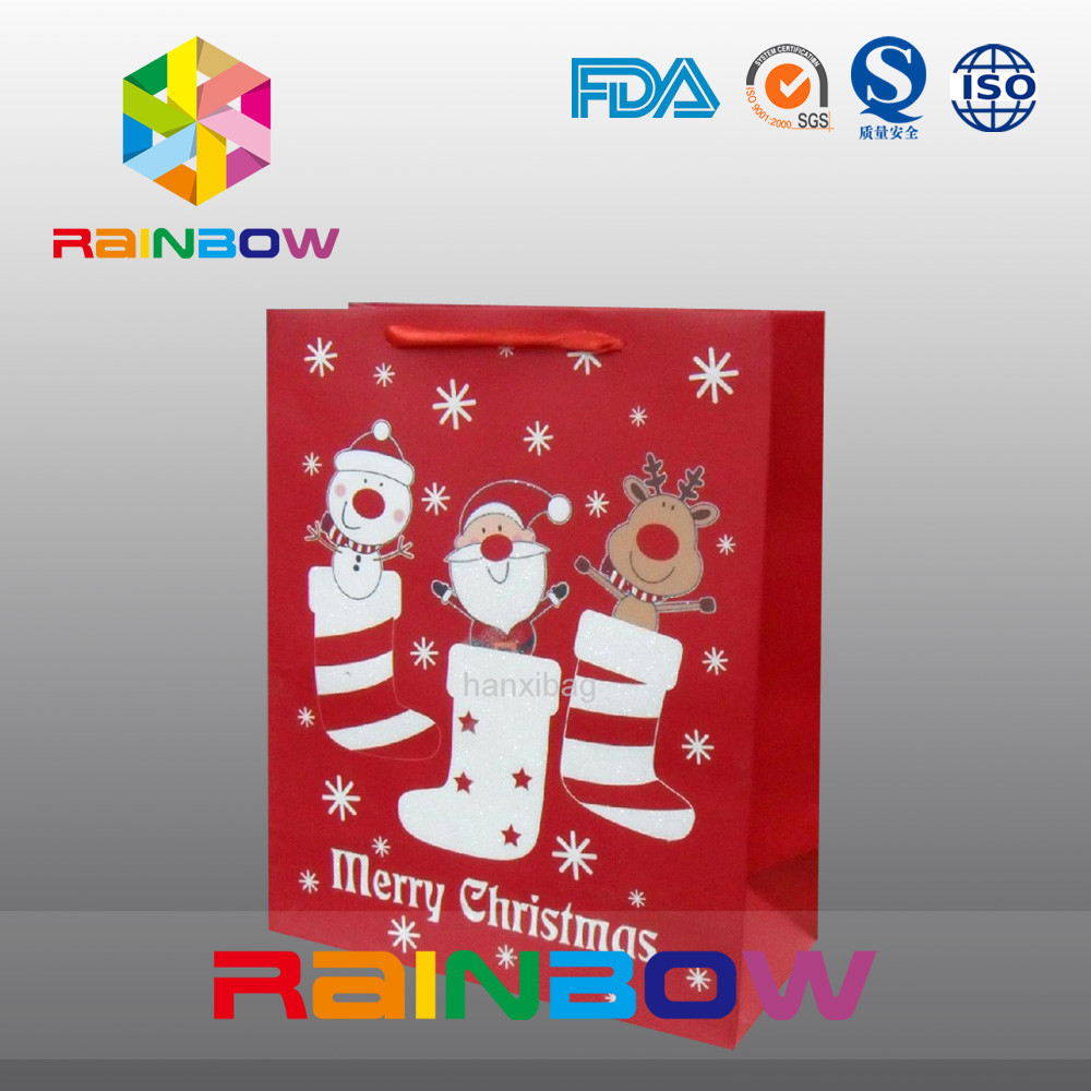 Il rosso ha personalizzato la borsa del regalo di Natale dei sacchi di carta con la corda rossa/sveglio stampata