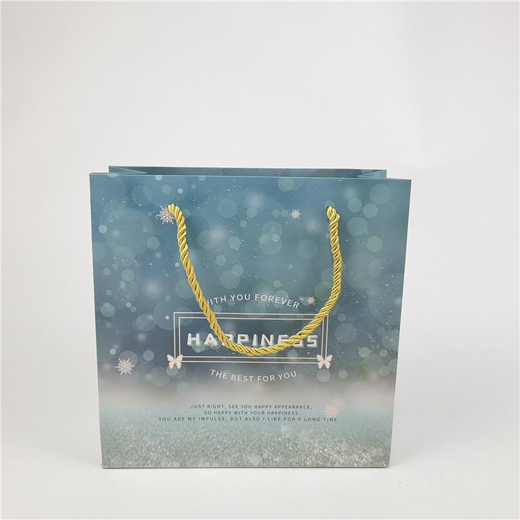 Best seller Logo riciclabile e rispettoso dell'ambiente Borsa di carta stampata Imballaggio Bianco 110 grammi Riutilizzabile