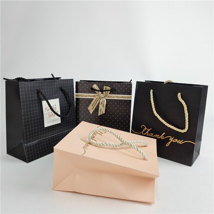 Di alta qualità stampa digitale personalizzata logo carta stampata sacchetto da shopping imballaggio bianco 110 grammi riutilizzabile