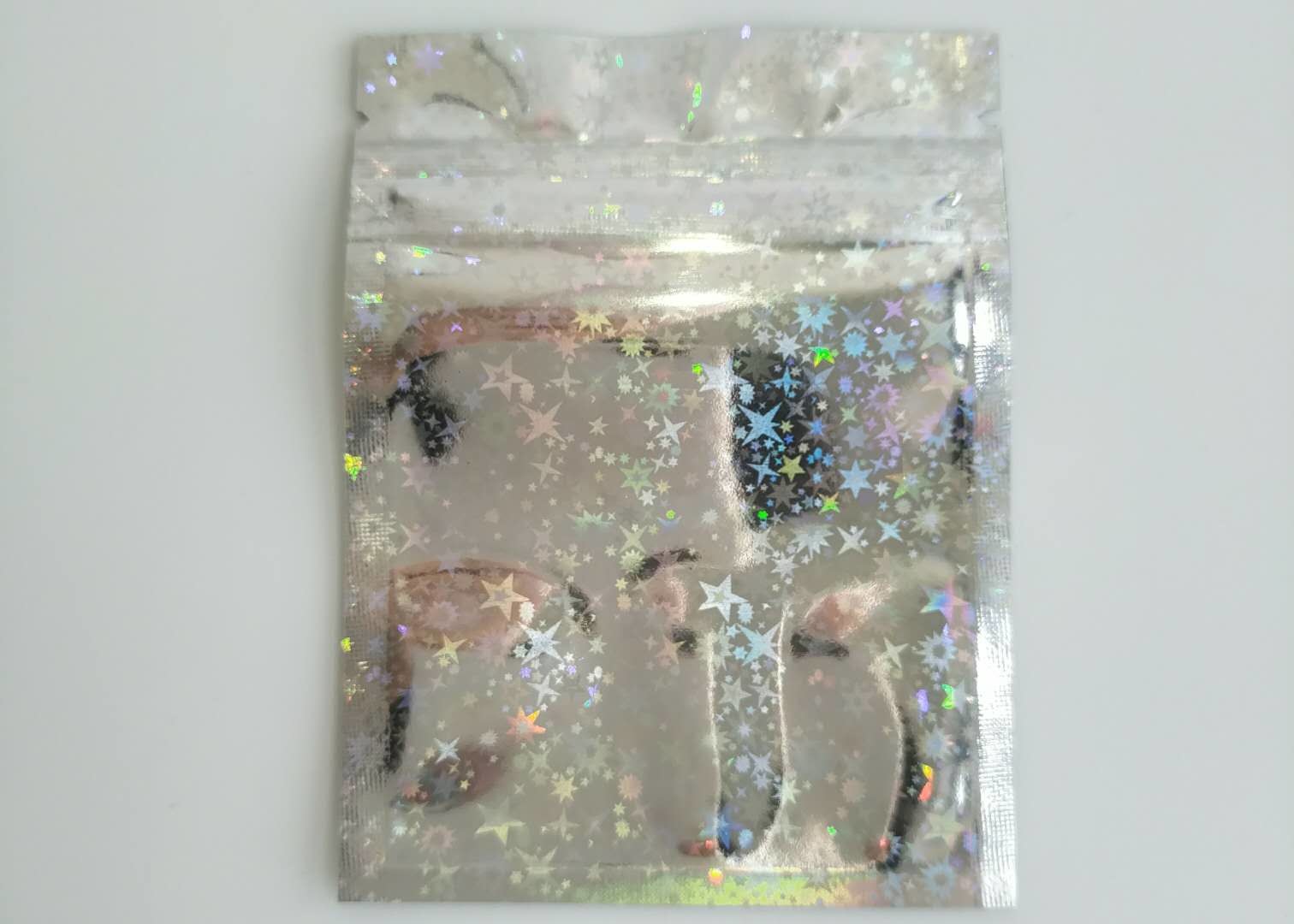 Stagnola olografica del laser Mylar del sacchetto laterale innocuo per i bambini della guarnizione tre allineata con la chiusura lampo
