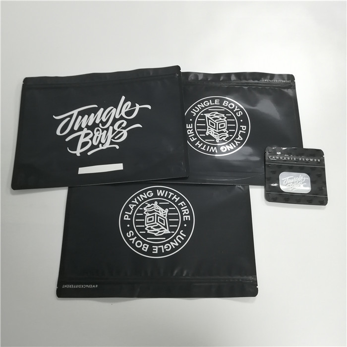 Le borse a chiusura lampo su ordinazione biodegradabili stanno sui ragazzi d'imballaggio Mylar della giungla della foglia del tabacco