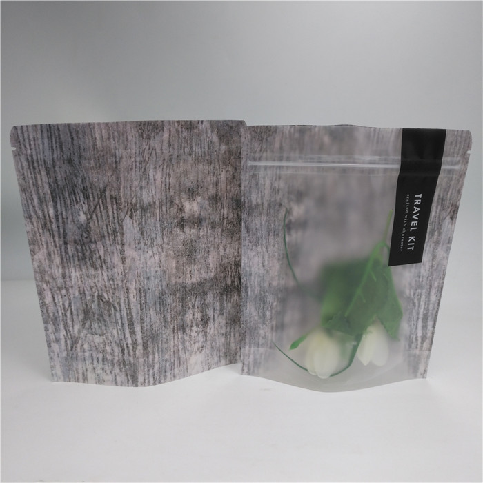 L'imballaggio dei cosmetici di Gu del fondo della serratura dello zip di plastica sta sul sacchetto di Mylar con la chiara parte anteriore