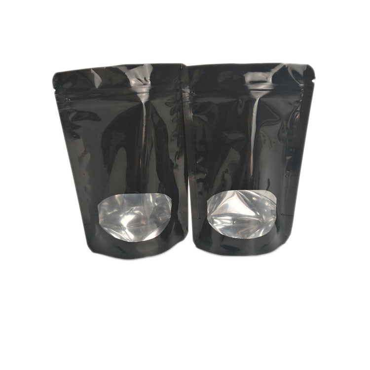 La rotocalcografia allineata stagnola anteriore trasparente sta sulle borse del sacchetto della chiusura lampo